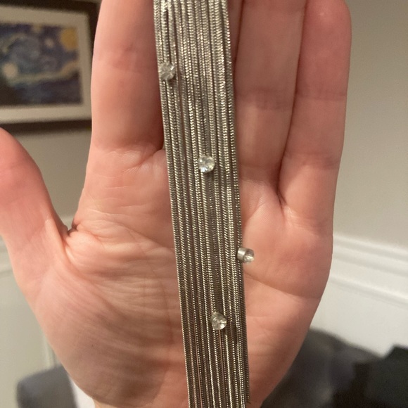 Silver like earrings, with crystal accents. - Picture 4 of 4